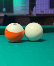 How “double touch” is used in billiards for complex combinations